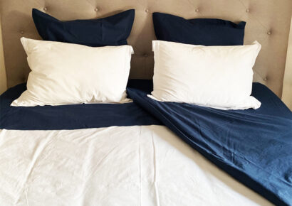 Une chambre digne d’un hôtel avec le linge de lit Greige